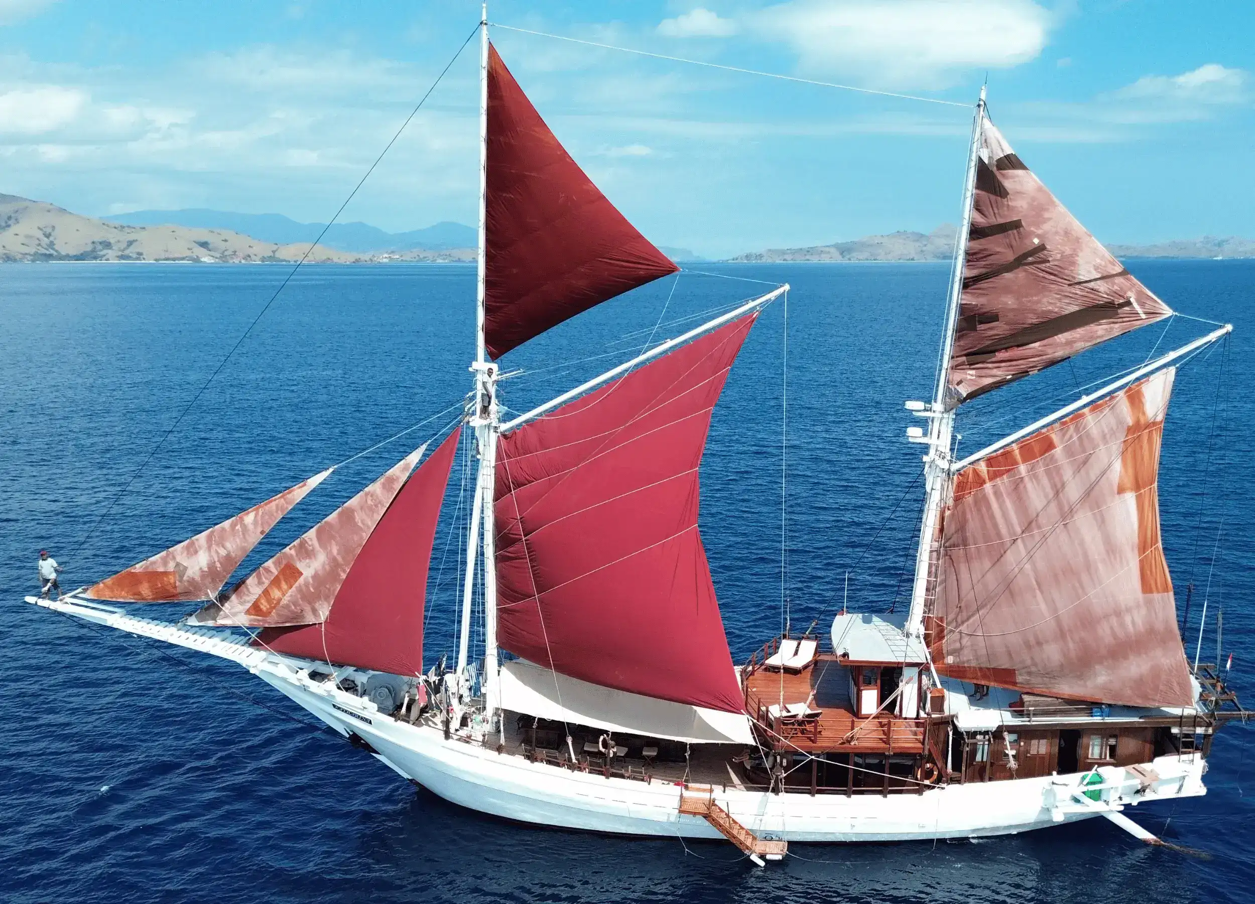 SeaTrek's Katharina ship with her bold and distinctive red sails set.