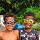 Happy kids pose using their goggles from SeaTrek