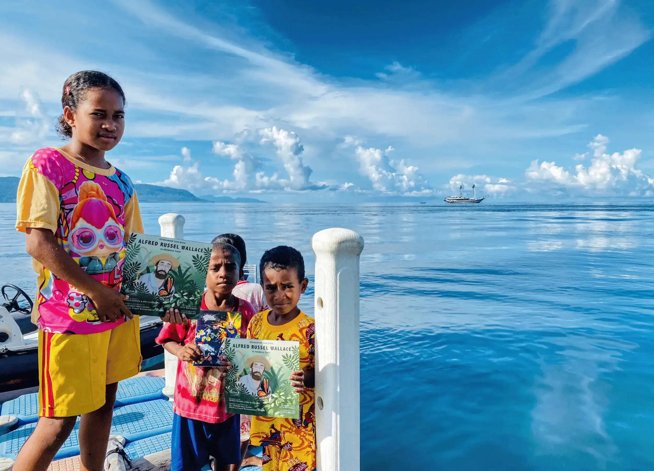 Kids with Alfred Russel Wallace's book.