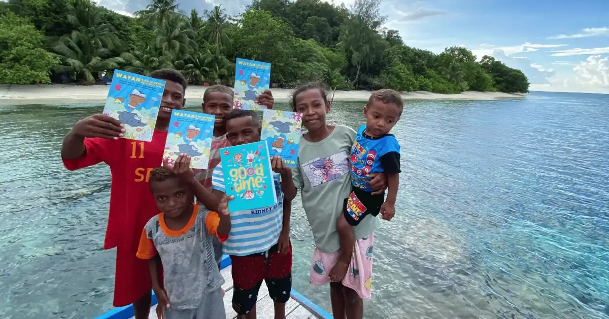 Kids with the Wayan and the Turtle King book