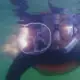 SeaTrek's guest swimming with stingless jellyfish in Raja Ampat