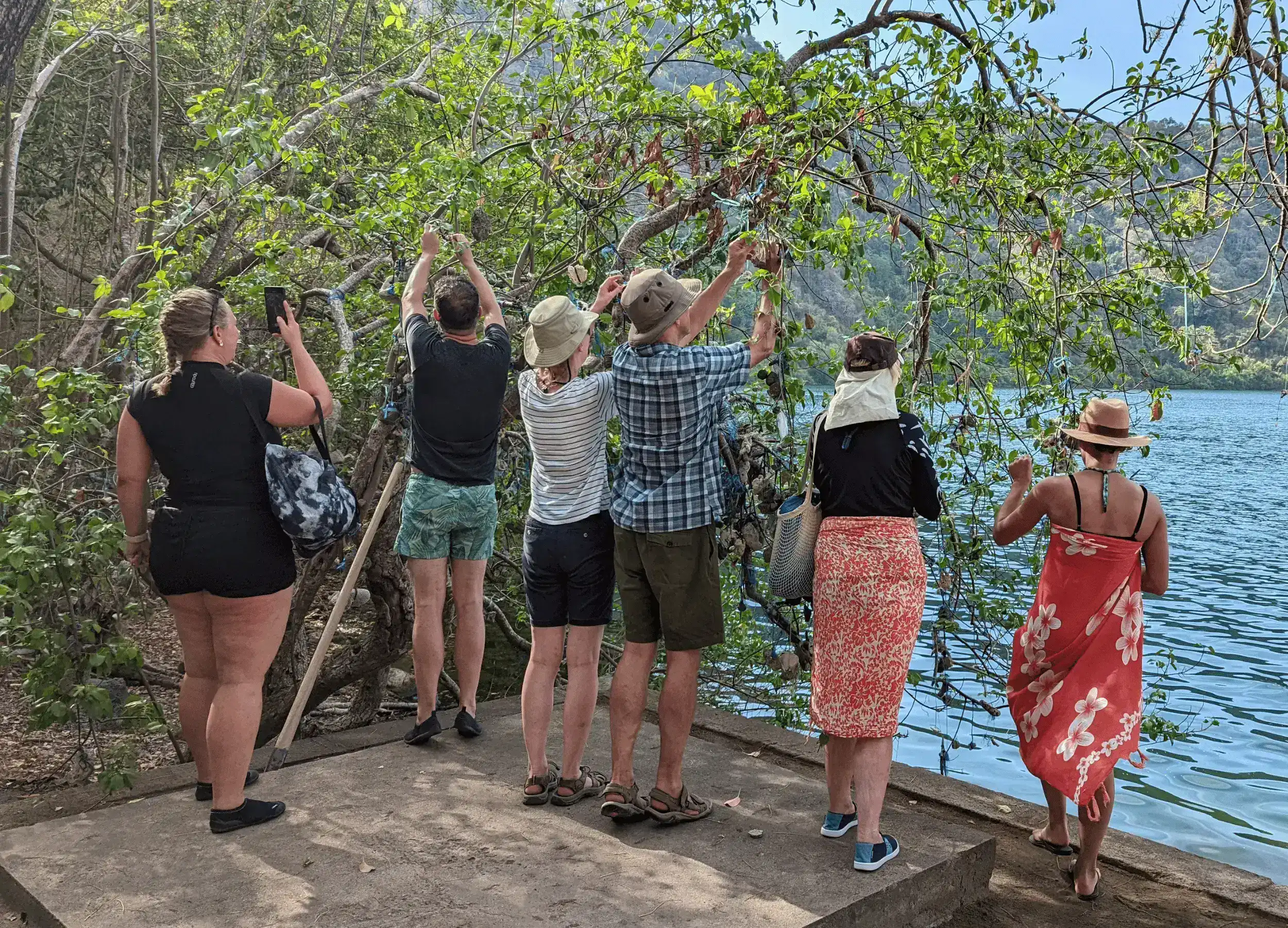 SeaTrek guests hanging stone in Satonda Lake