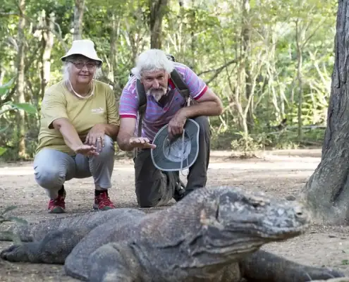SeaTrek's guest taking photo with the Komodo Dragon