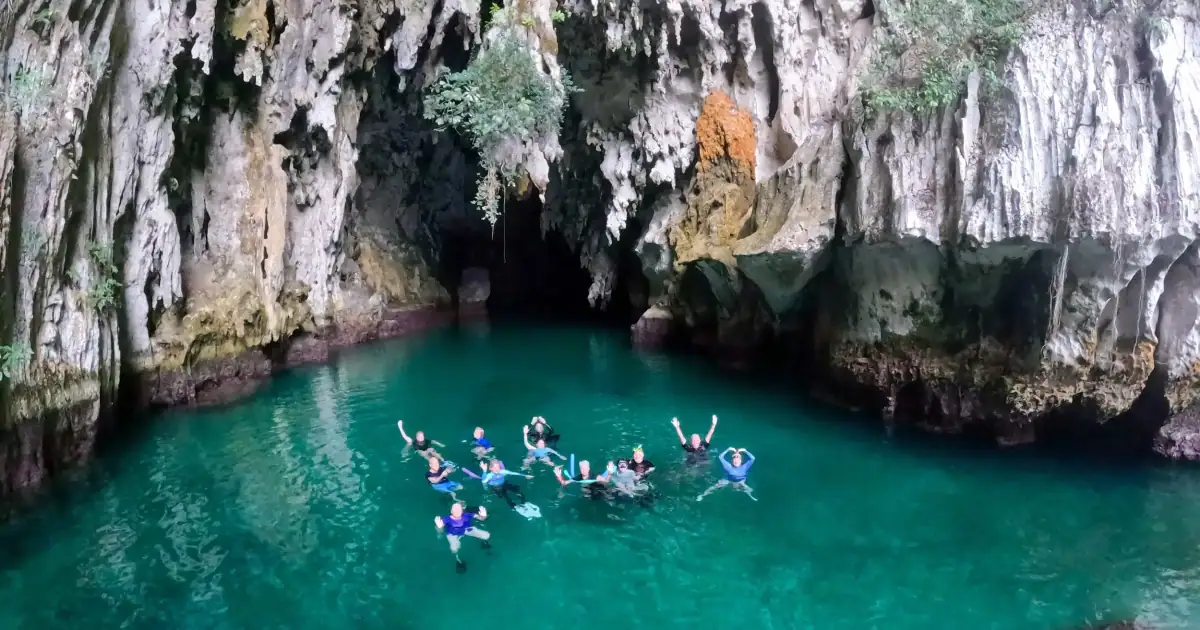SeaTrek's guests swimming in the Tomolol Cave Raja Ampat