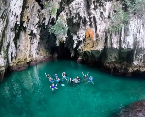 SeaTrek's guests swimming in the Tomolol Cave Raja Ampat