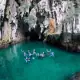 SeaTrek's guests swimming in the Tomolol Cave Raja Ampat