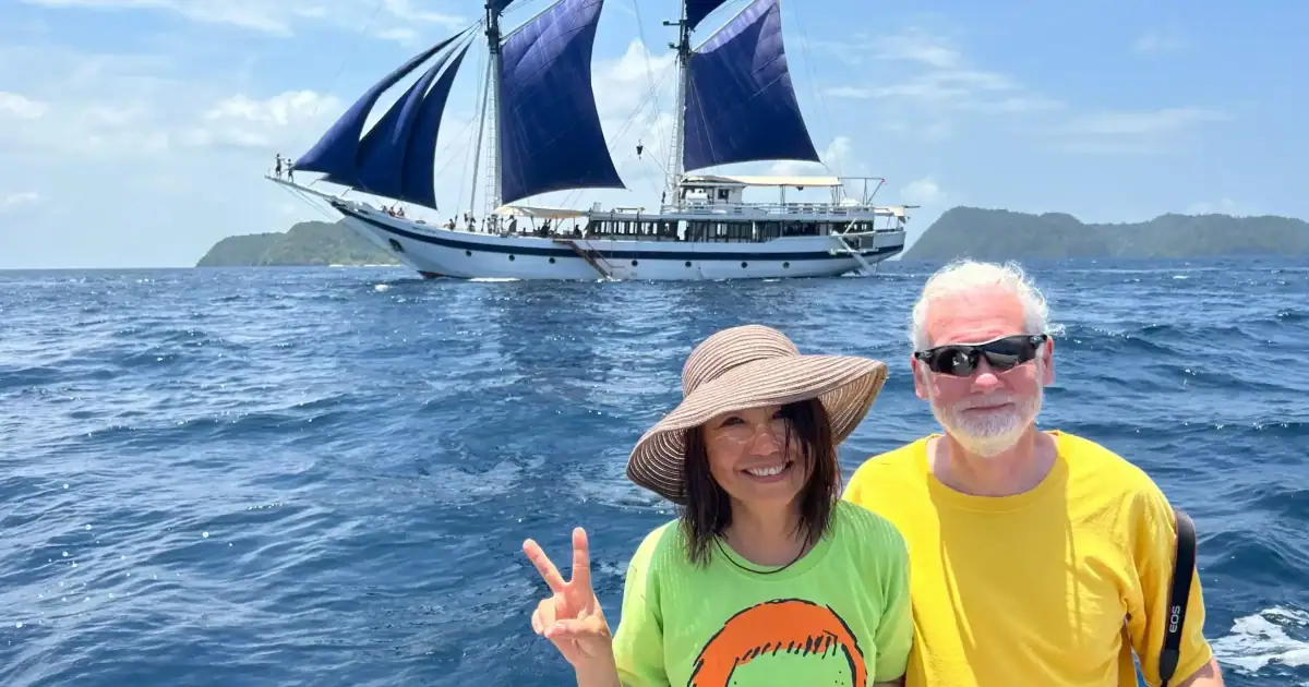 Barry Clarke and YT taking photo with Ombak Putih sails up