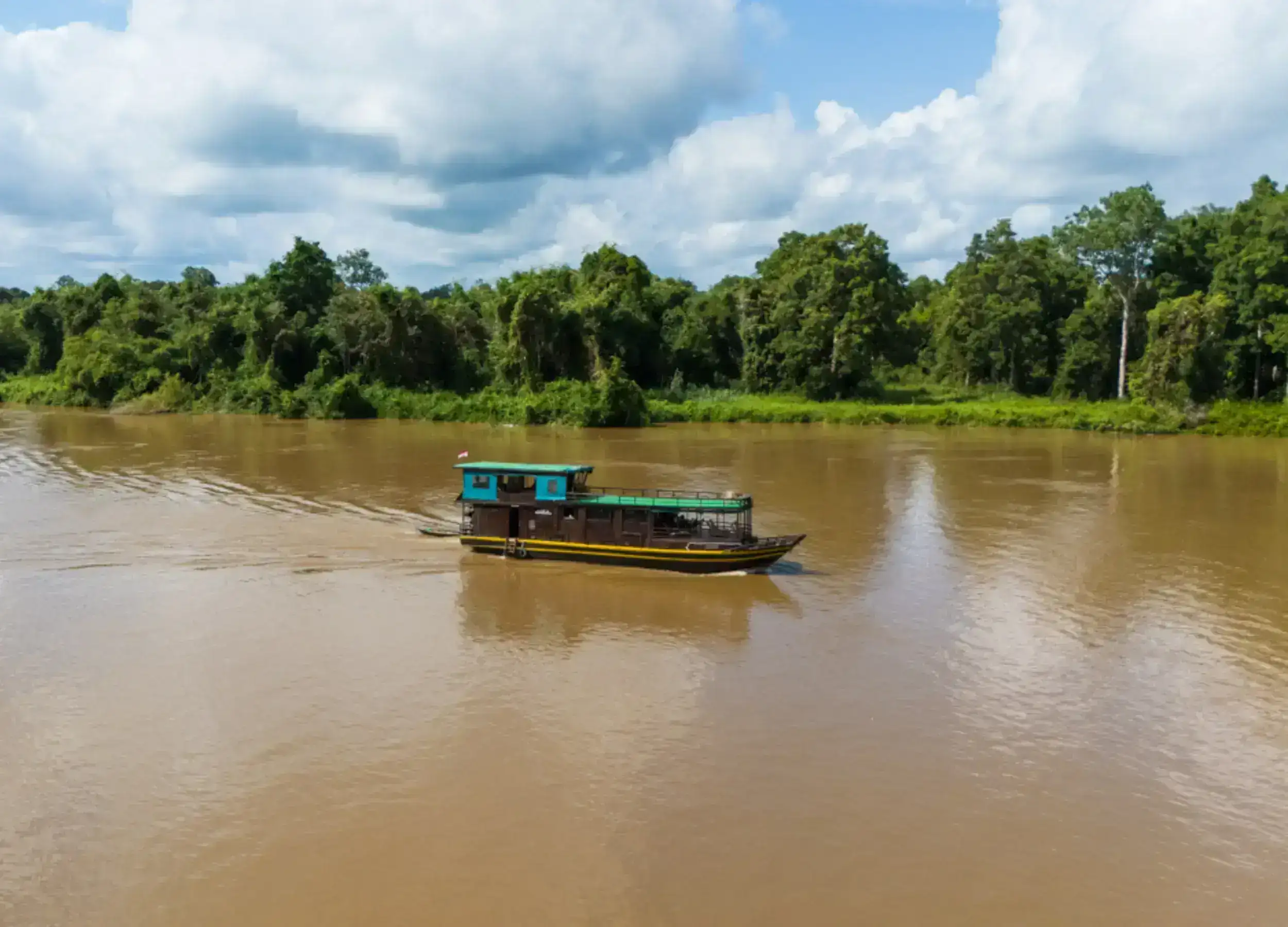 Rahai'i Pangun cruising the Kahayan River in Borneo