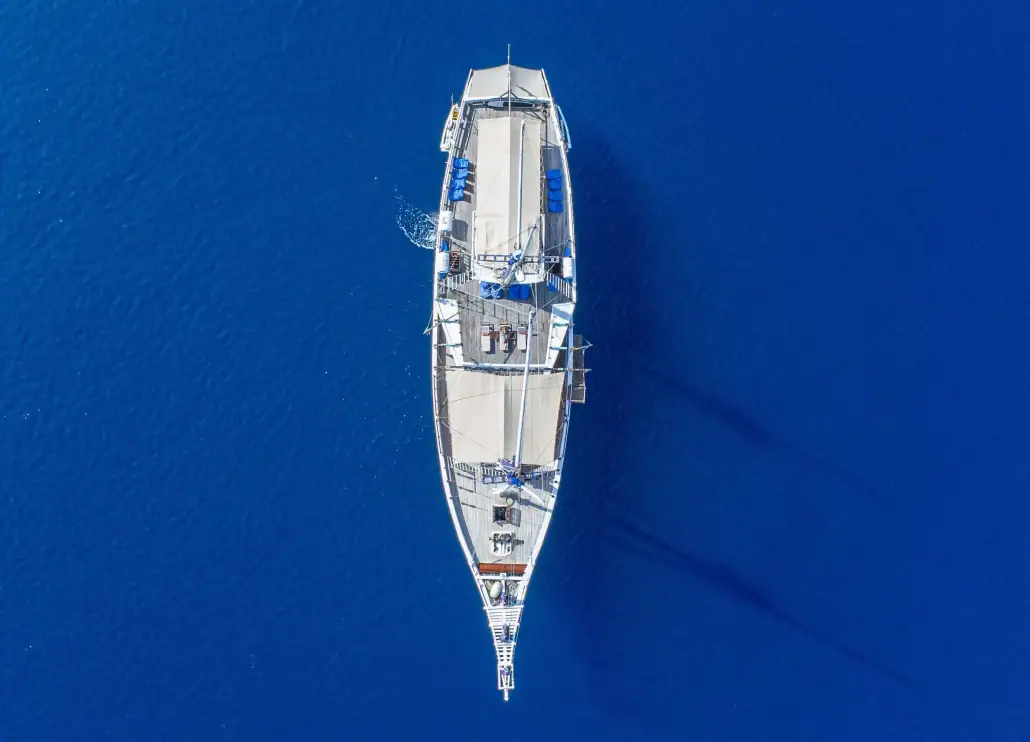 Ombak putih ship drone shot view showing the top deck and blue calm ocean