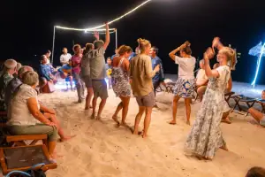 Guest and Crew singing and dancing