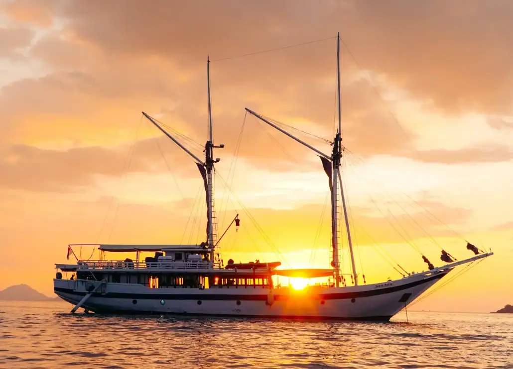 Ombak Putih with sunset of Komodo