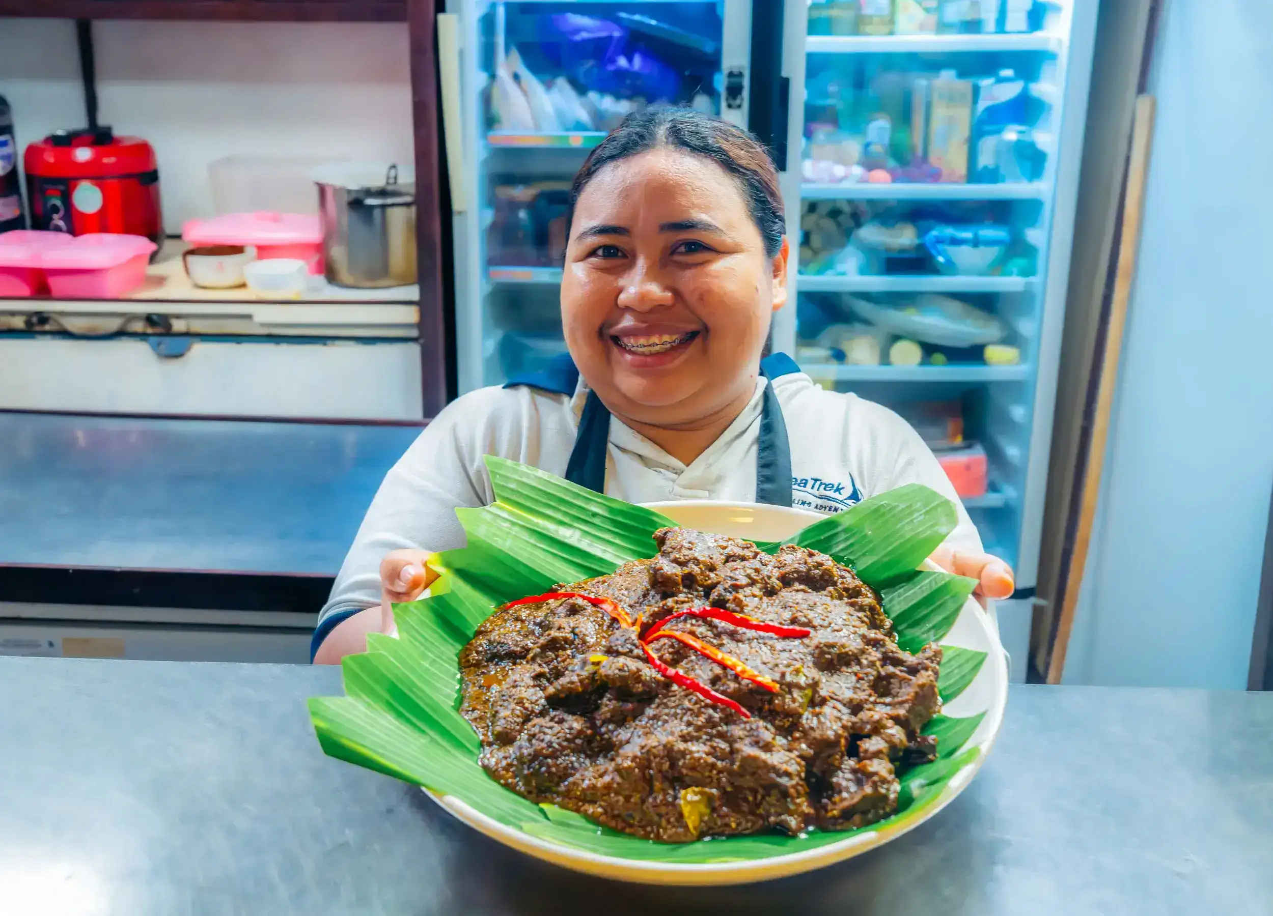 Chef Atin serving Beef Rendang