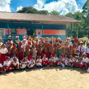 Group photo with teachers and students of Aduwei school after the library handover.