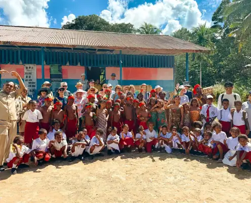 Group photo with teachers and students of Aduwei school after the library handover.