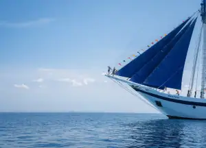 Ombak Putih with guest on the bow