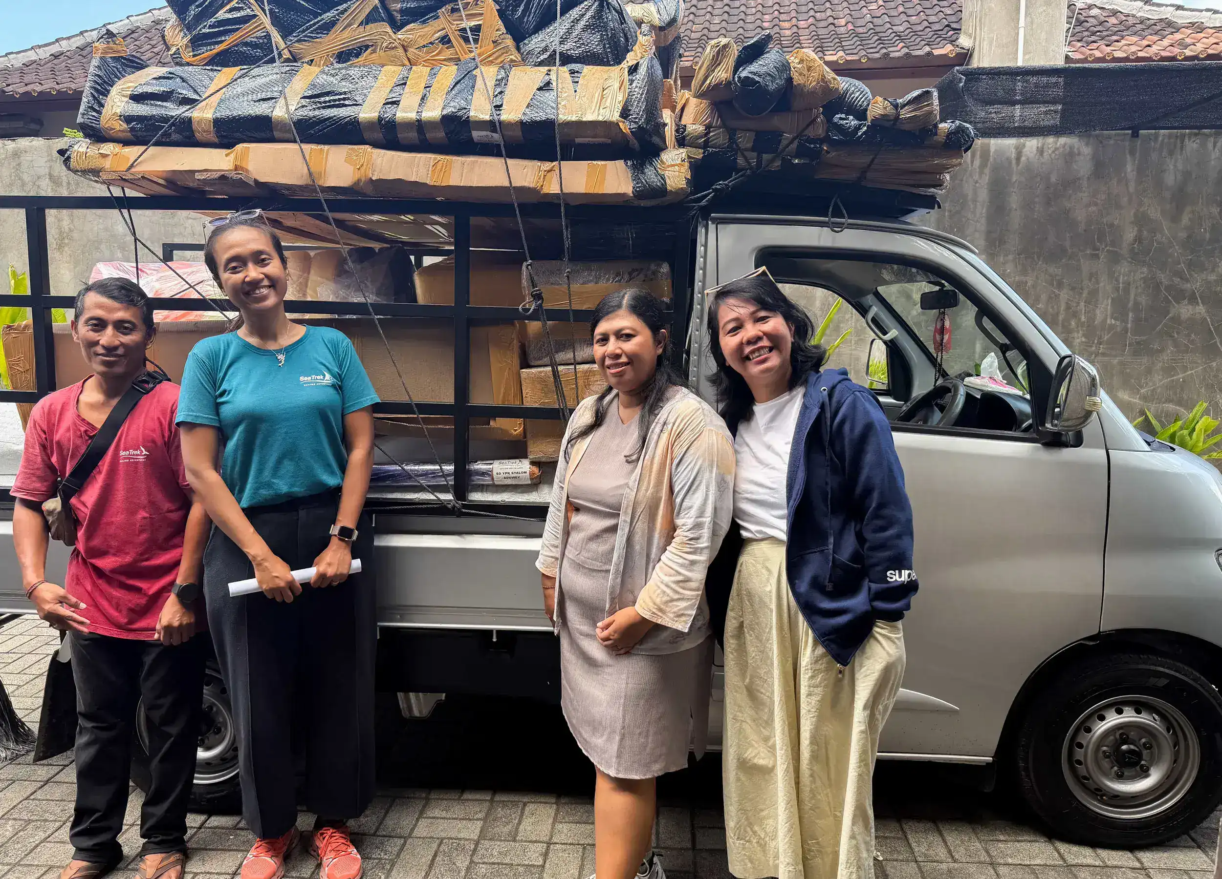 SeaTrek team and Yayasan Literasi Anak Indonesia preparing library materials