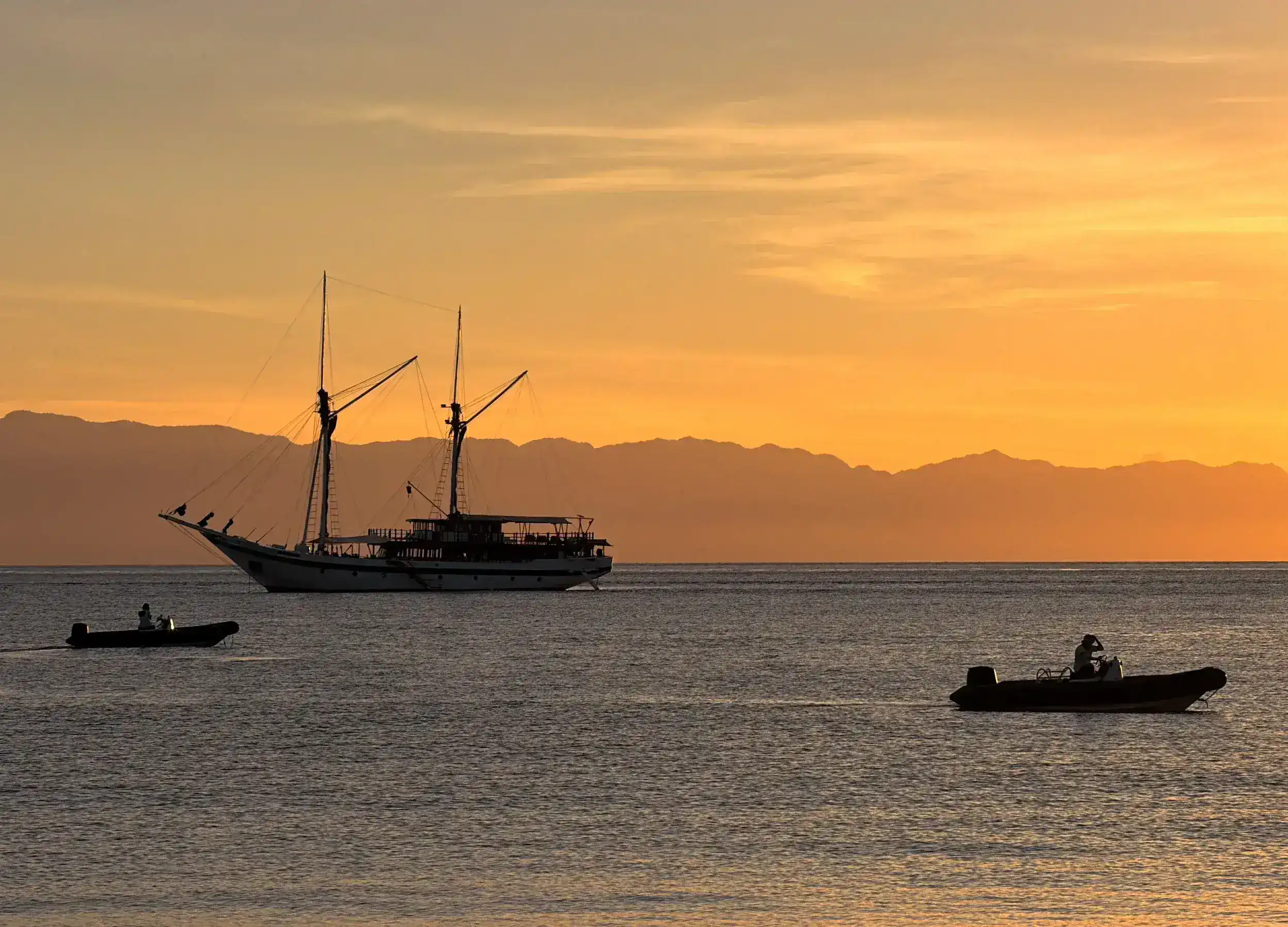 Ombak Putih with sunset background
