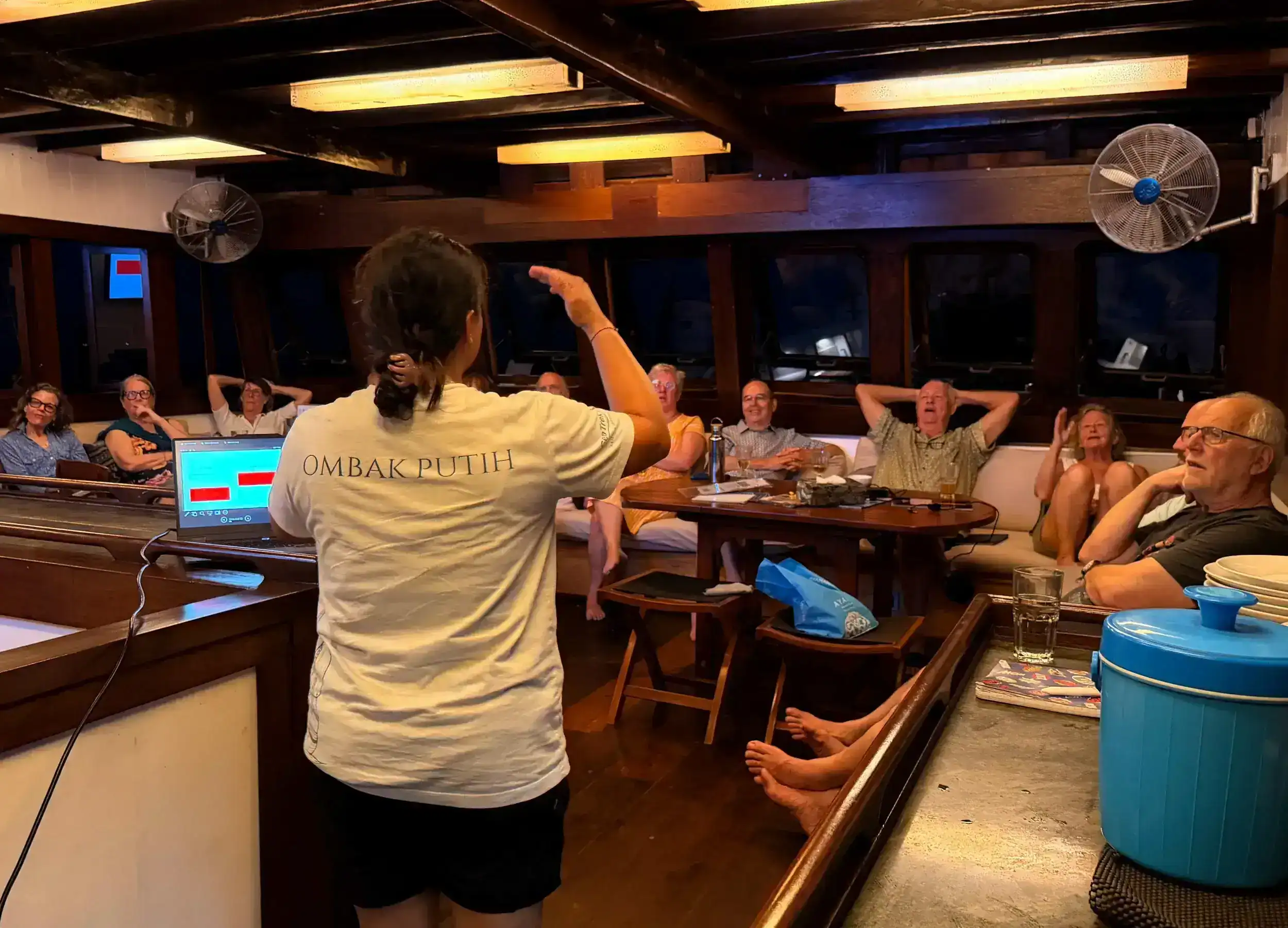Tour leader giving night presentation