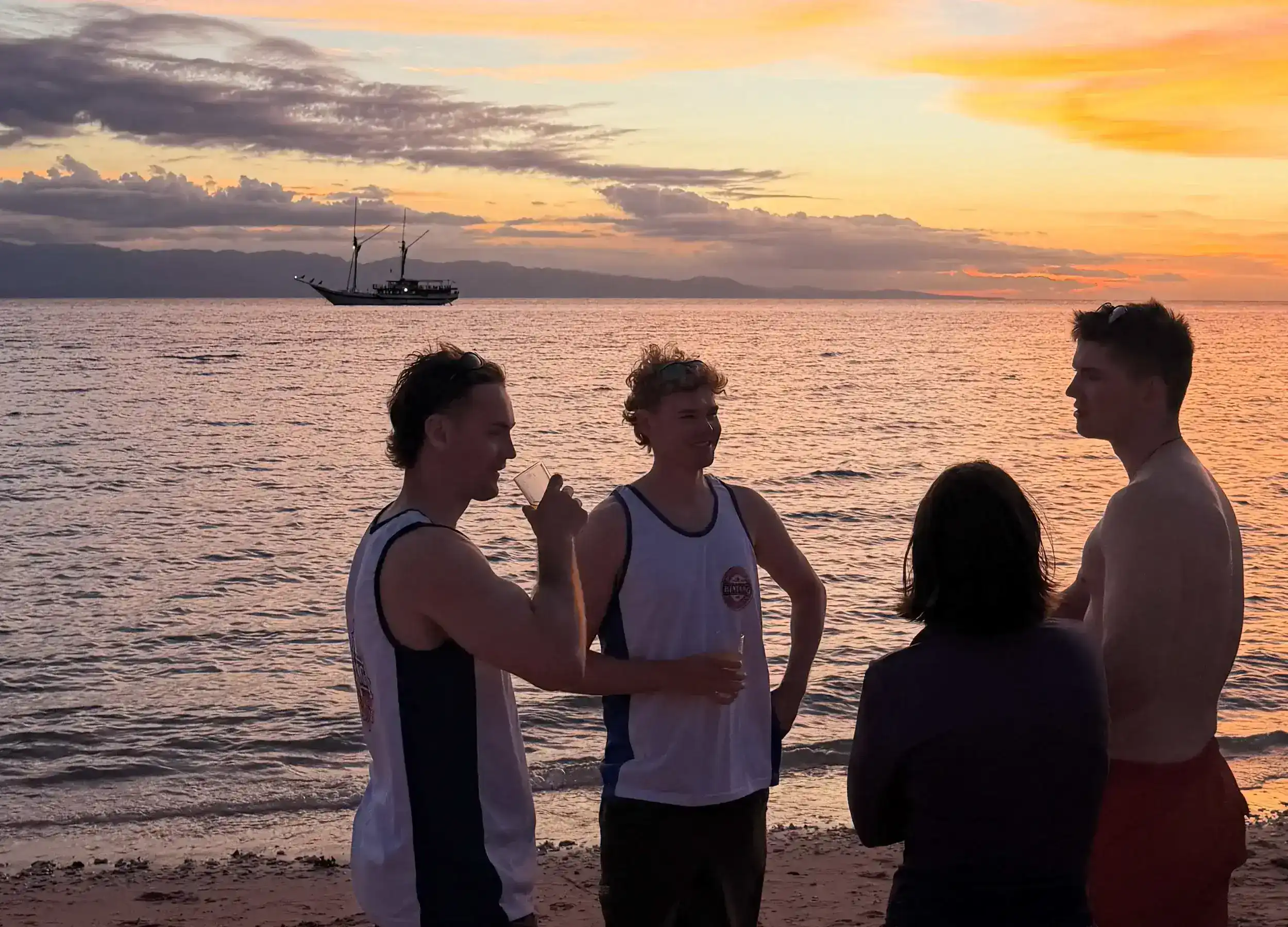 Enjoying sunset beer at Pink Beach